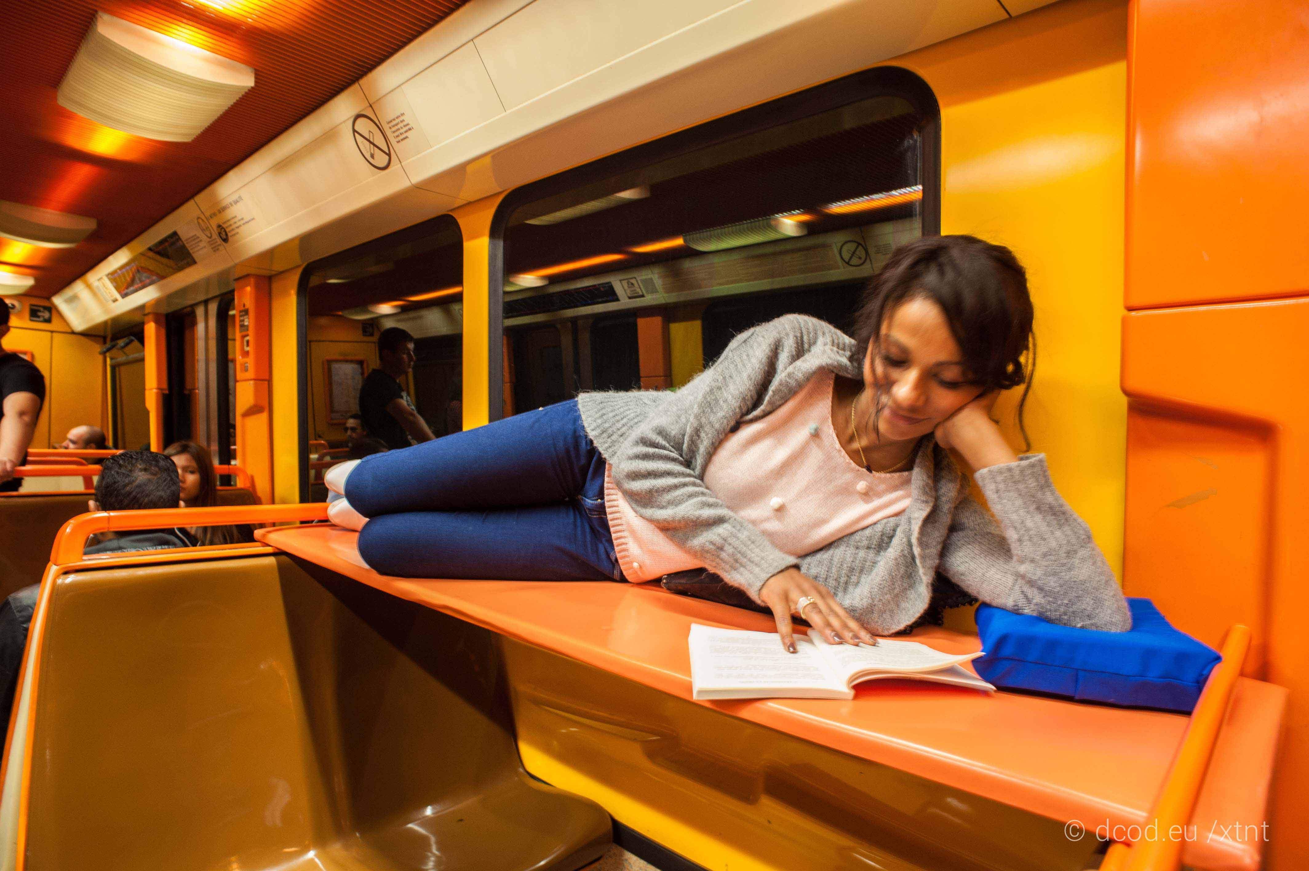 Woman Reading Orange Board